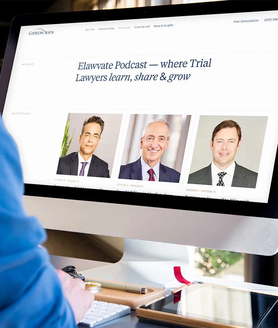 Gideon Asen website displayed on a desktop iMac showing the Elawvate Podcast page with recent episode guest headshots